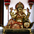 Lord Ganesha Seated on Chowki Figurine – Exotic India Finish Premium Brass Idol (15 Inch)