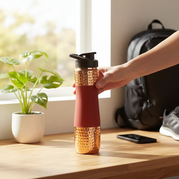 RoyalStuffs Designer Copper Hammered Sipper Bottle with Red Silicone Grip – 1 Litre Leak-Proof Copper Bottle