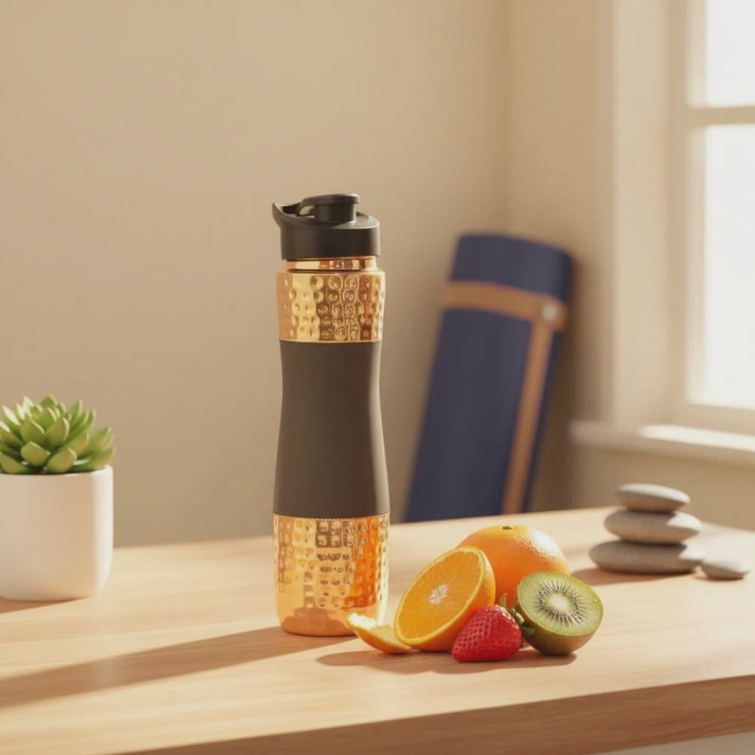 RoyalStuffs Designer Copper Hammered Sipper Bottle with Grey Silicone Grip – 1 Litre Leak-Proof Copper Bottle
