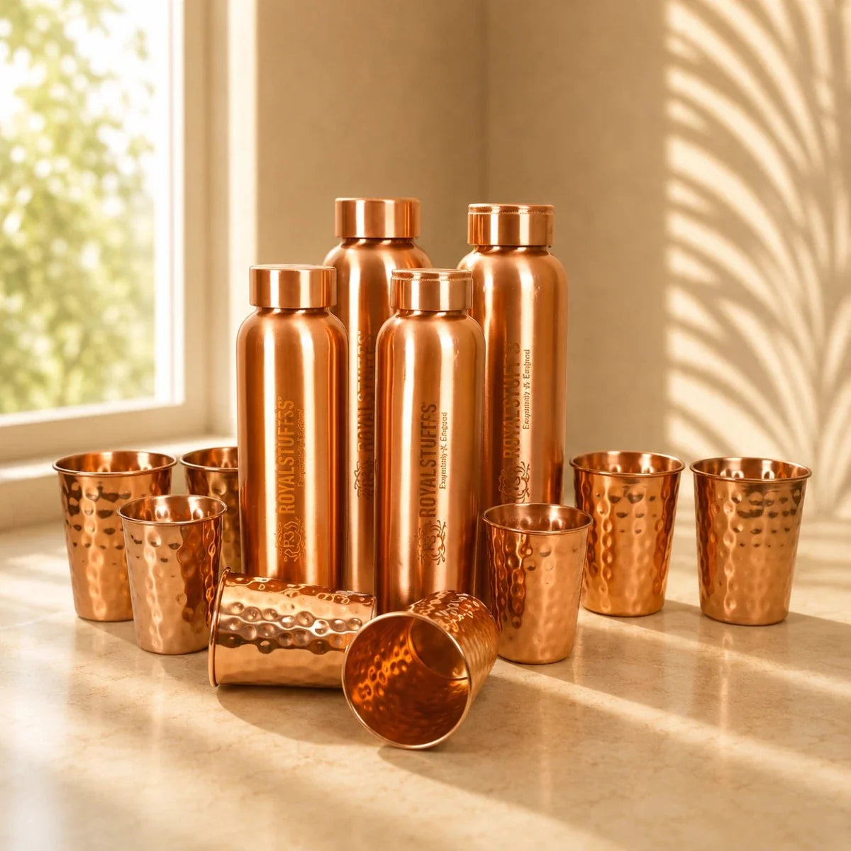 RoyalStuffs Copper Water Bottle Set – 4 Pure Copper Bottles with 8 Hammered Tumblers (900 ML)