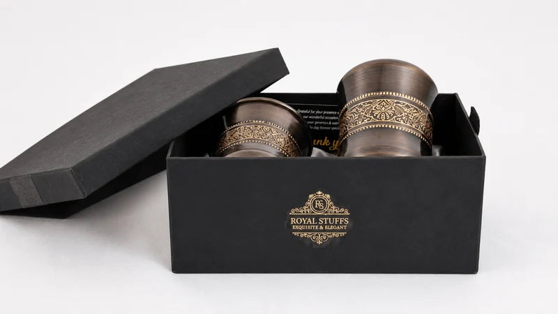 RoyalStuffs Pure Copper Antique Engraved Tumbler Set – Set of 2 Brown Copper Water Glasses with Gift Box (300 ML)
