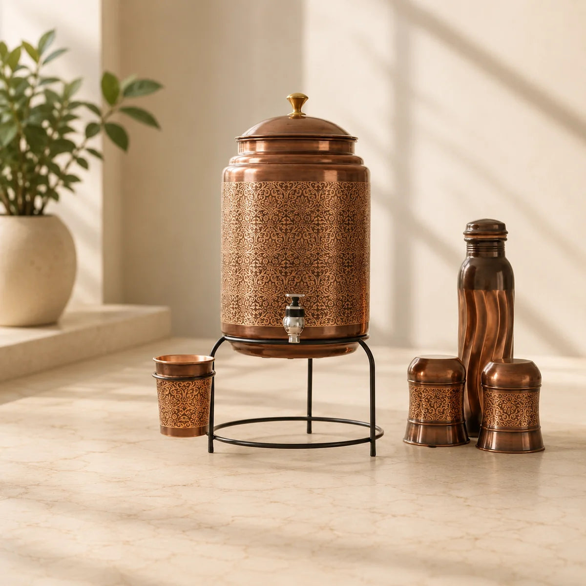 RoyalStuffs 8 Liter Embossed Black Copper Water Dispenser Set – Copper Tank with Stand, 3 Glasses & 1000 ML Bottle